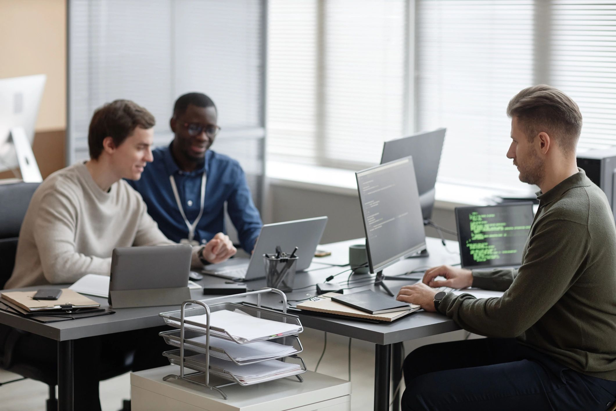 IT professionals working together in a modern office