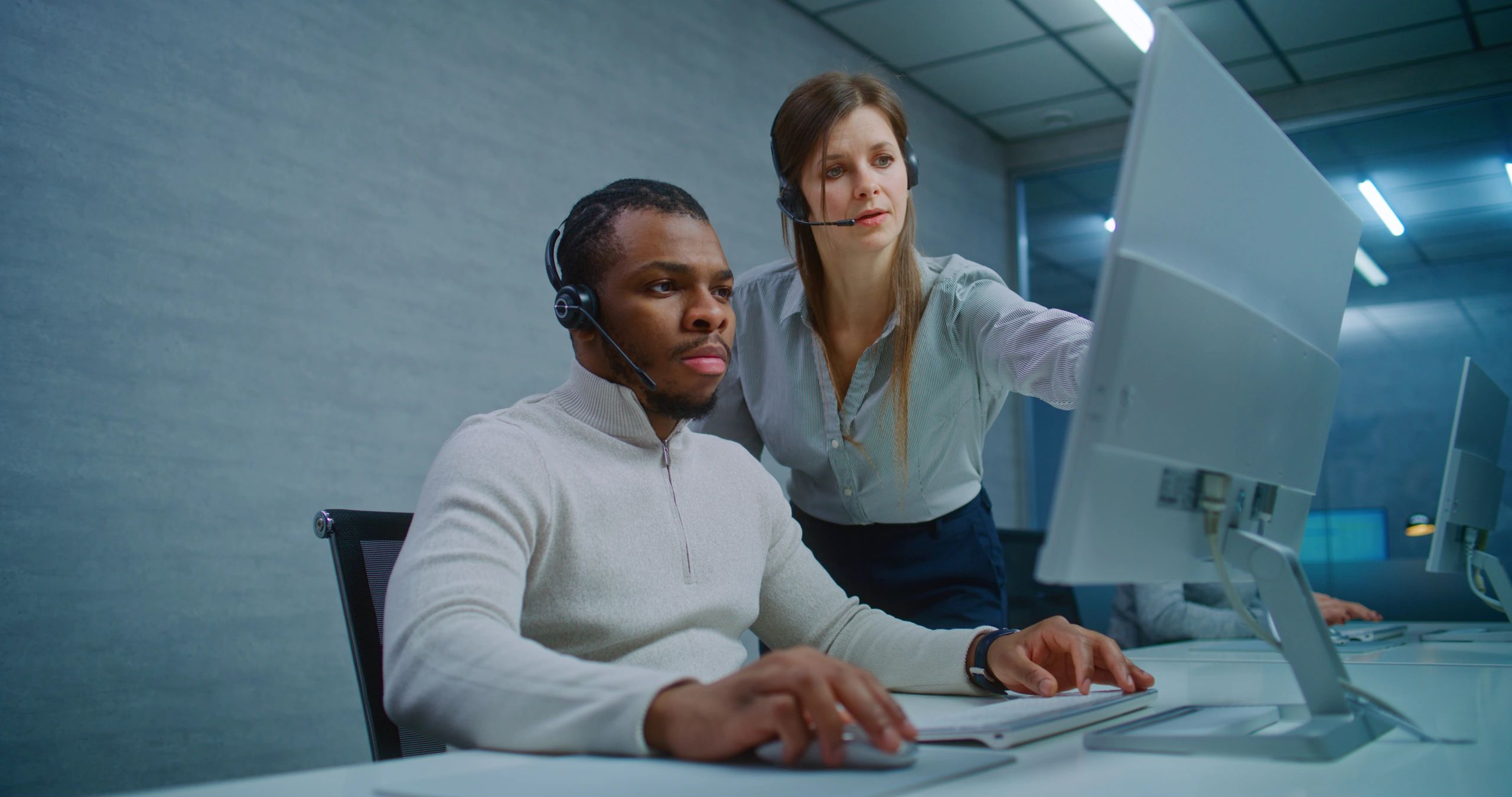 IT support specialists working at computers